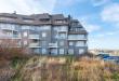 Uitzonderlijk doorloop-appartement aan het strand van Groenendijk.