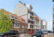 A recently built, move-in-ready flat with a side view of the sea in the Robbe Douce residential complex.