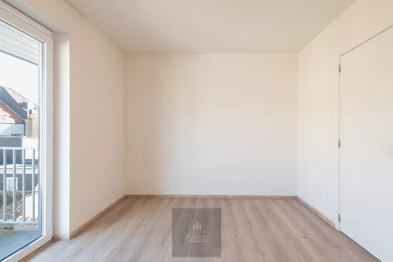 Recent one-bedroom apartment with parking space and basement storage room.