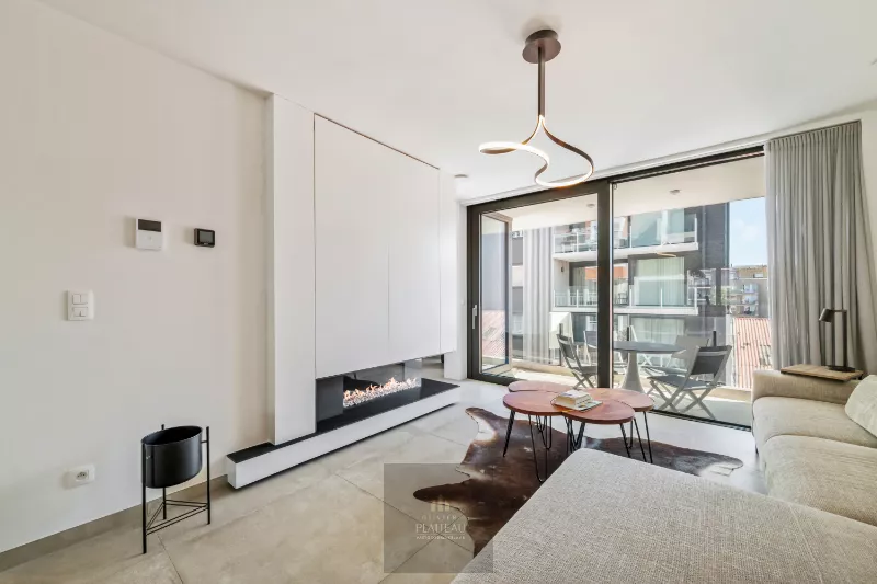A recently built, move-in-ready flat with a side view of the sea in the Robbe Douce residential complex.