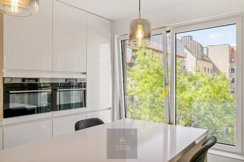 A recently built, move-in-ready flat with a side view of the sea in the Robbe Douce residential complex.